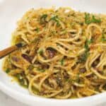 Anchovy pasta with breadcrumbs in a bowl.