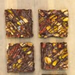 Nutty brownies drizzled with chocolate.