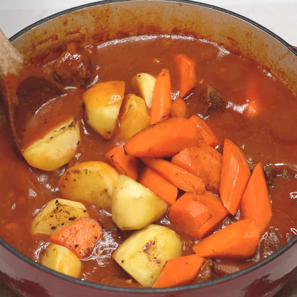 Added carrots and potatoes to the stew.
