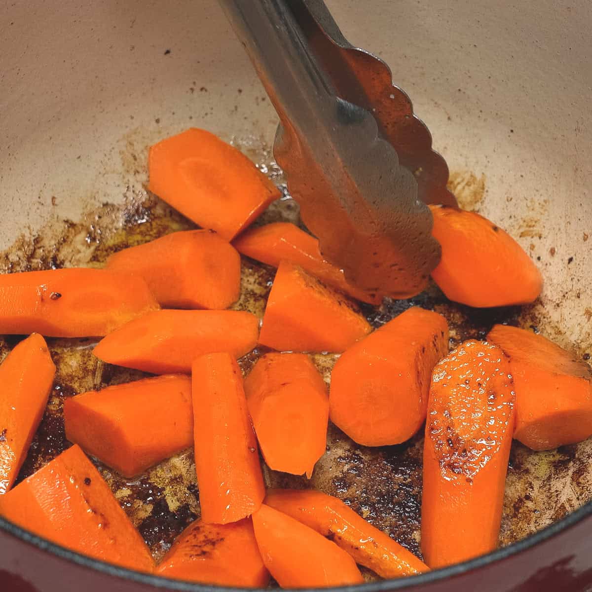 Searing the carrots.