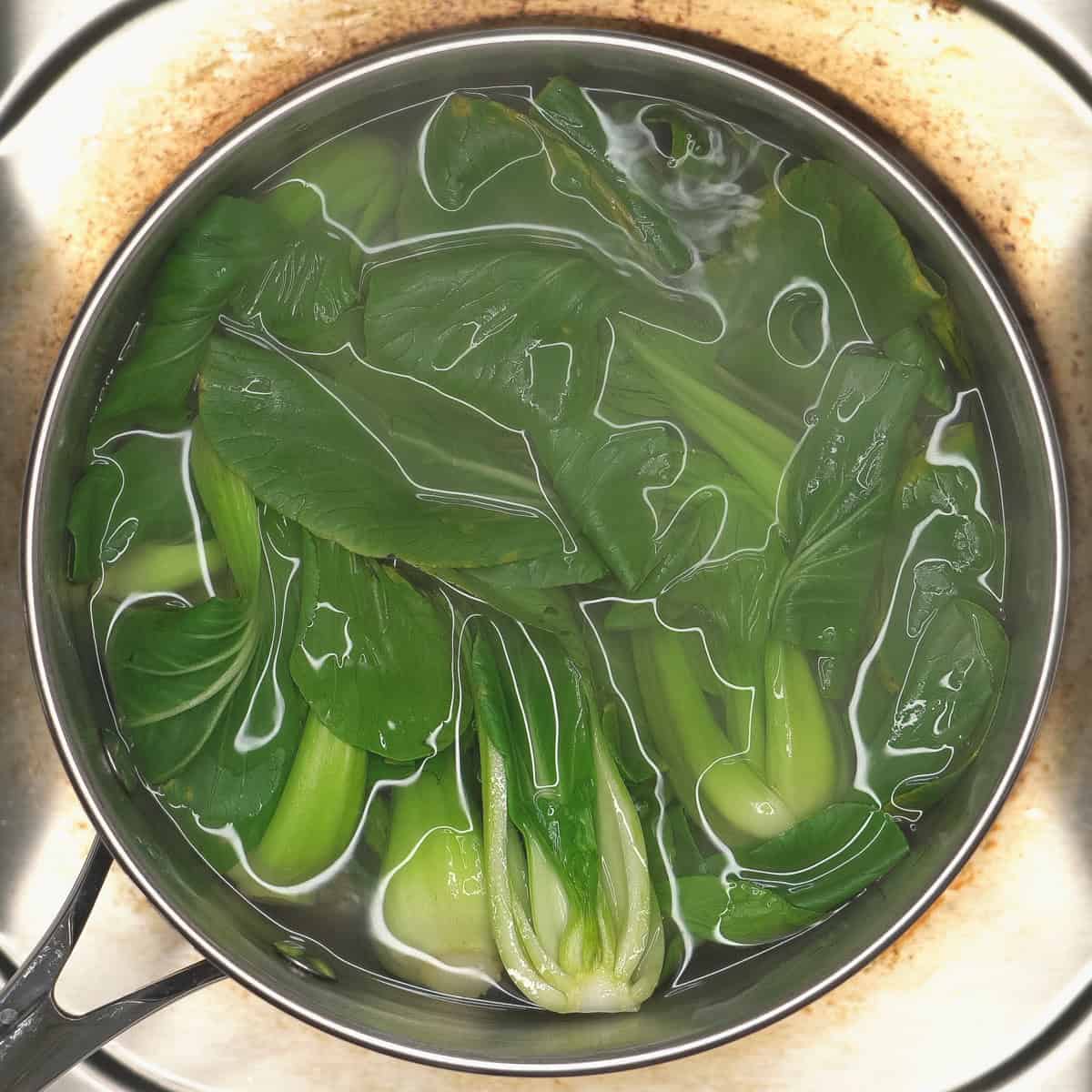 Shanghai bok choy in boiling water