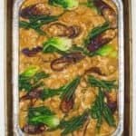 Big Batch of Beef Kare-kare on a tray.