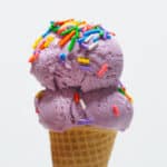 Ube purple yam ice cream on a cone.