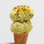 Avocado Pistachio Ice cream in a cone.