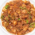 Pork Binagoongan (Pork with Shrimp Paste) on a plate.