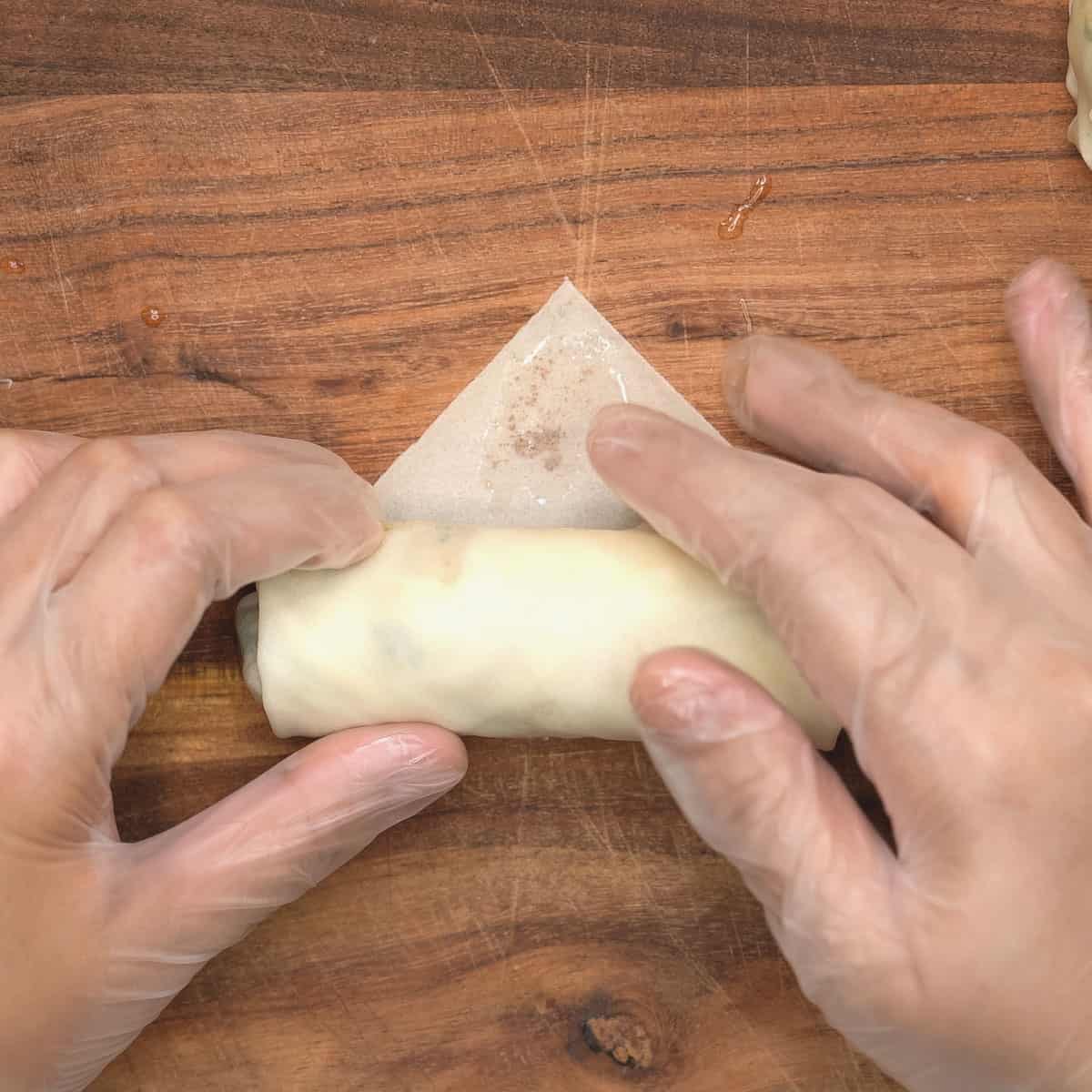 sealing the lumpia wrapper