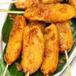Banana Cue (Caramelized Bananas) on a plate with banana leaf.
