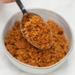 Latik (Caramelized Coconut Curds) in a bowl.