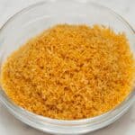 Toasted coconut in a bowl.