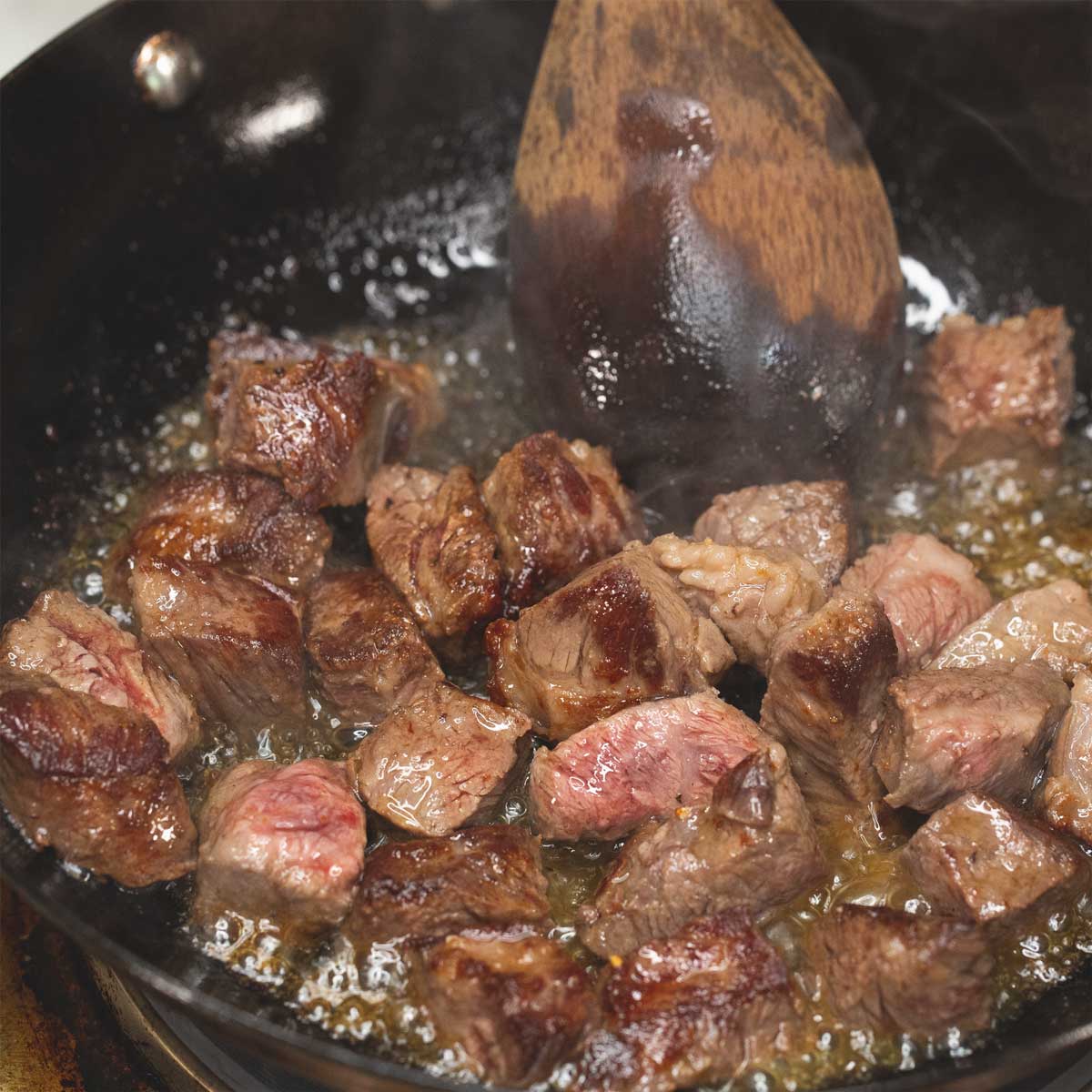 searing the other side of the beef