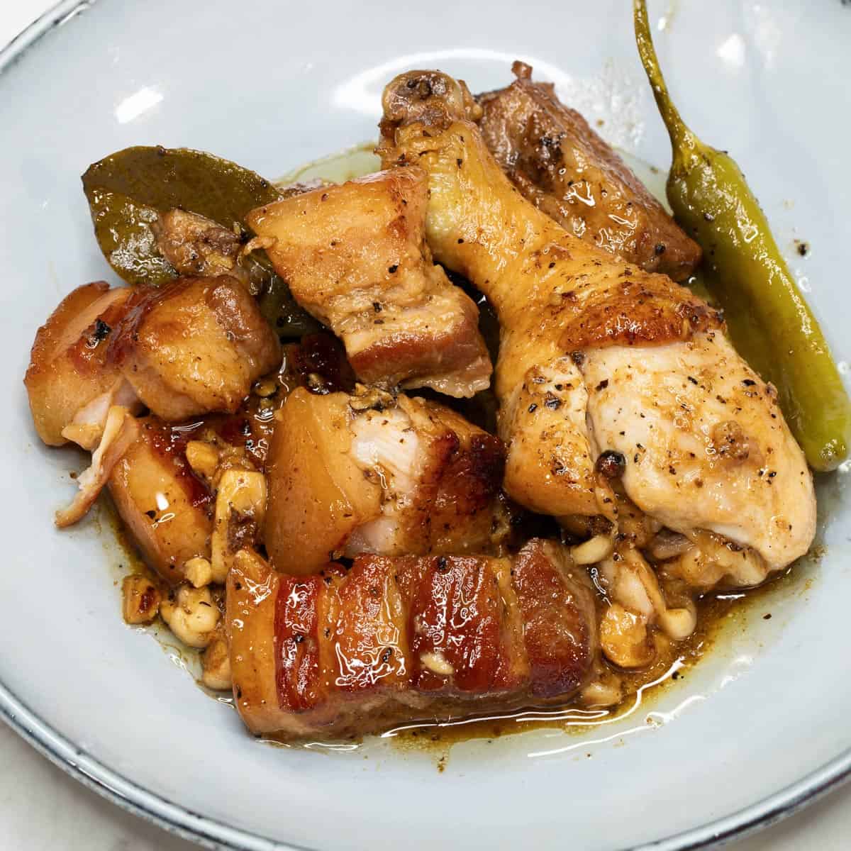 Adobong puti on a plate.