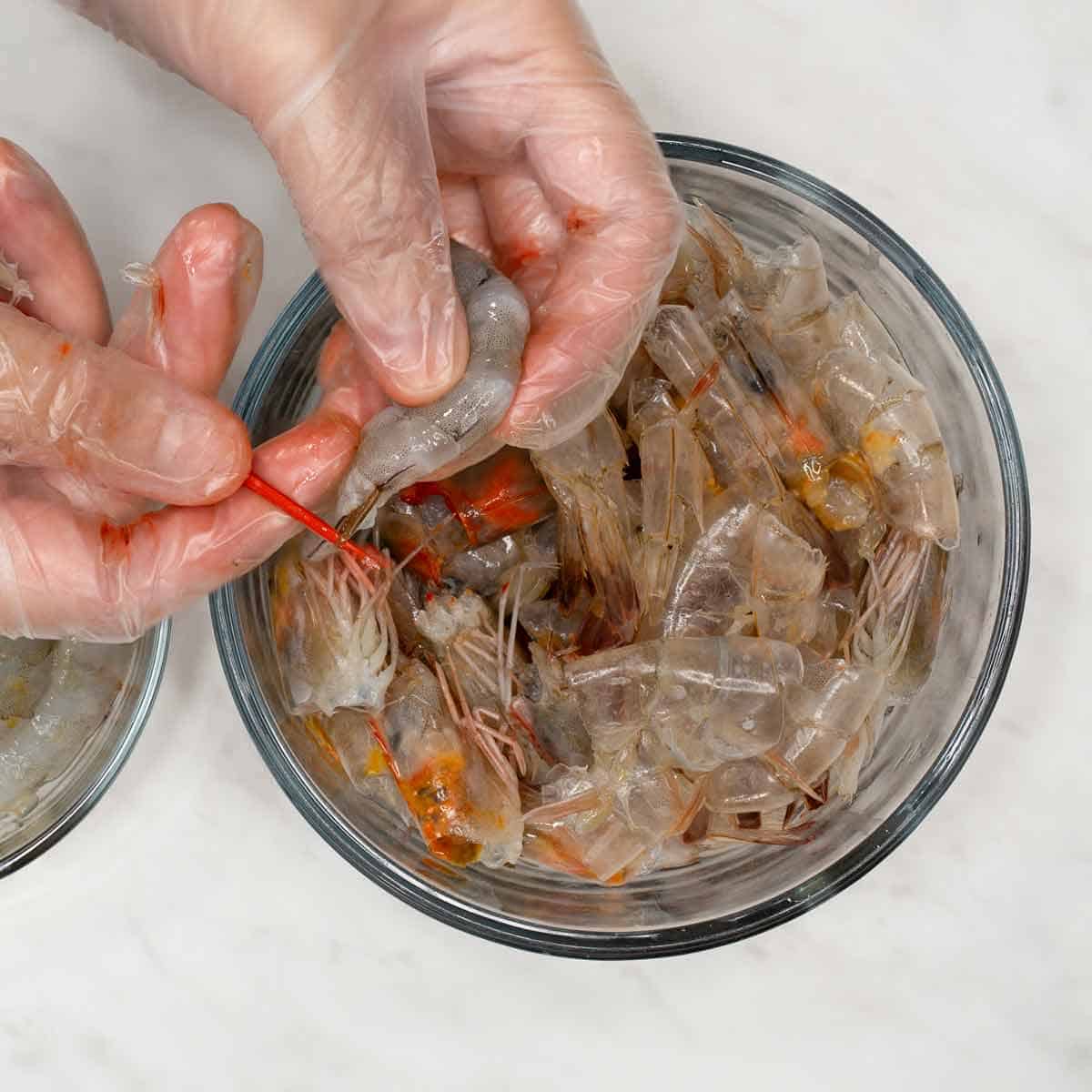 Deveining the shrimp.