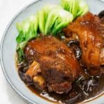 Pork Pata Tim on a plate with batchoy.