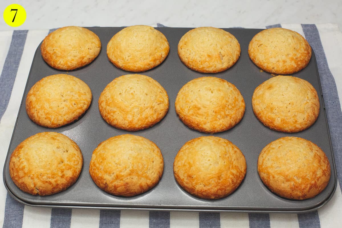 Baked Cheese Cupcakes on a muffin pan.