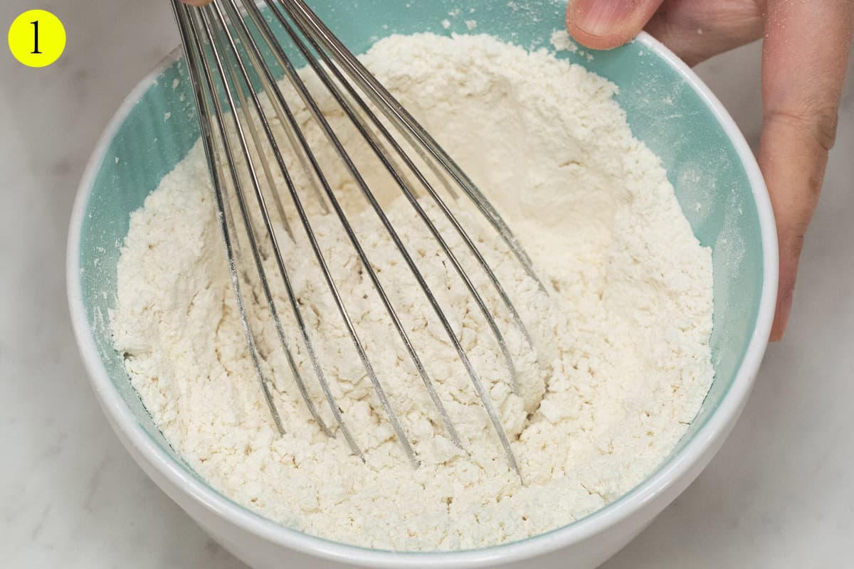 Mixing the dry ingredients in the bowl.