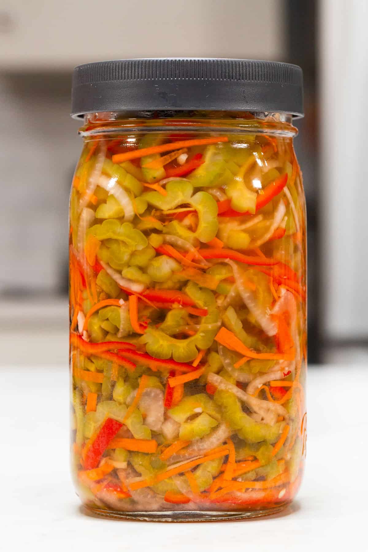 Atchara Ampalaya in a mason jar.
