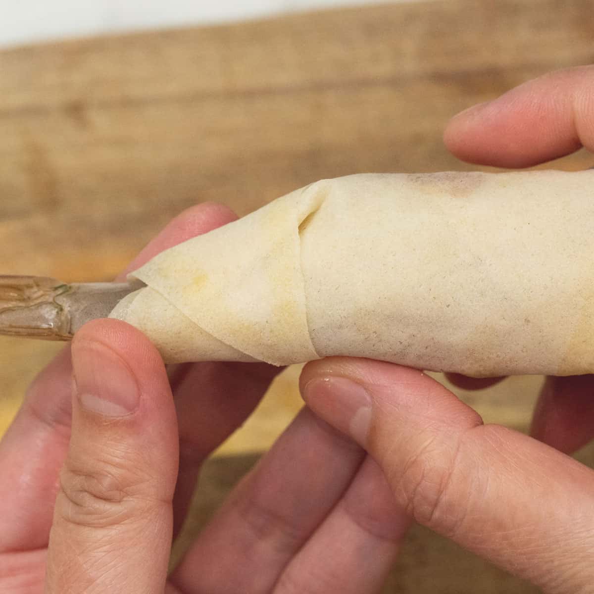 sealing while folding in the area where the shrimp tail sticks out.