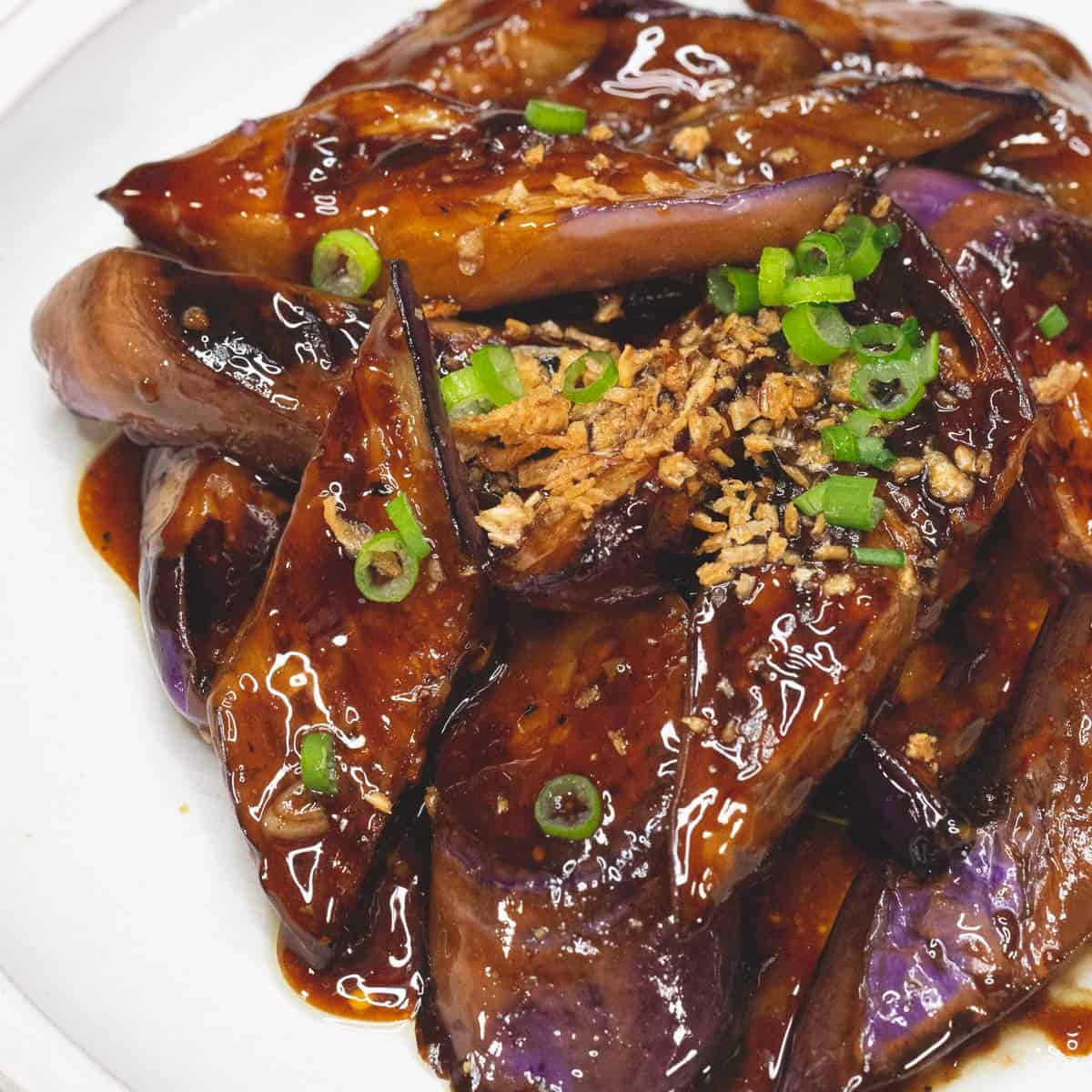 Adobong talong on a plate.