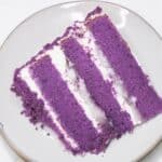 A Slice of Ube Macapuno Cake on a plate.