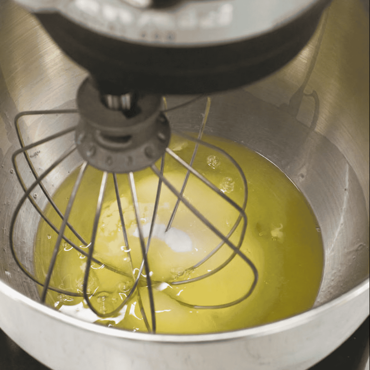 Egg whites, sugar, and cream of tartar in the mixer bowl.