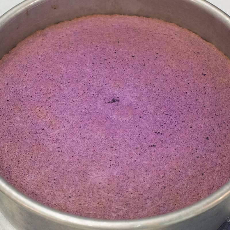 Baked ube chiffon cake in the pan.