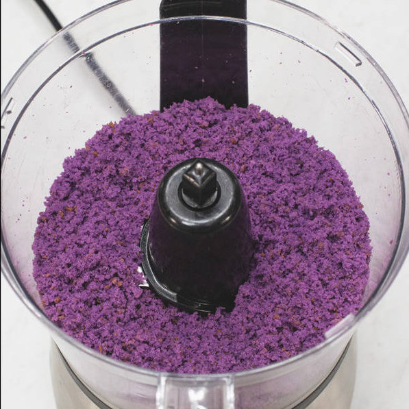 Fine purple cake crumbs in the food processor.
