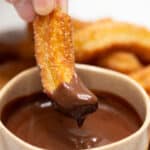 Churros dipped in Tablea Chocolate sauce.
