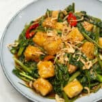 Stir Fried Kangkong and Tofu on a plate