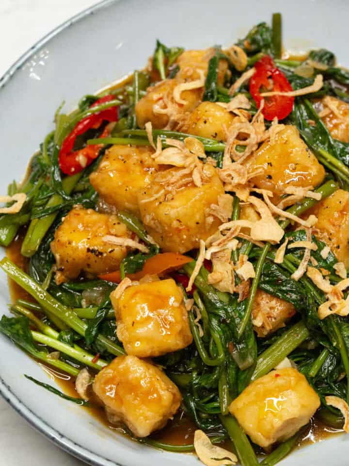 Stir Fried Kangkong and Tofu on a plate