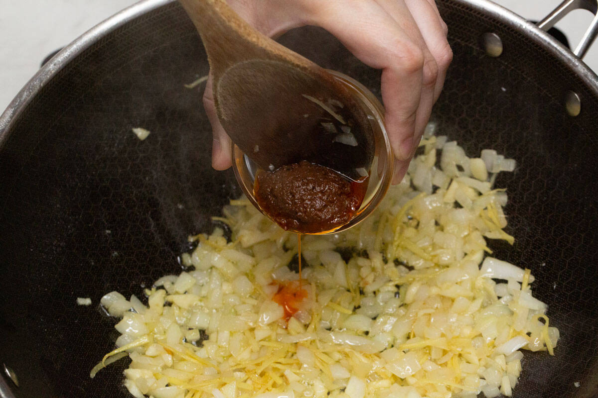 Adding shrimp paste to the aromatics