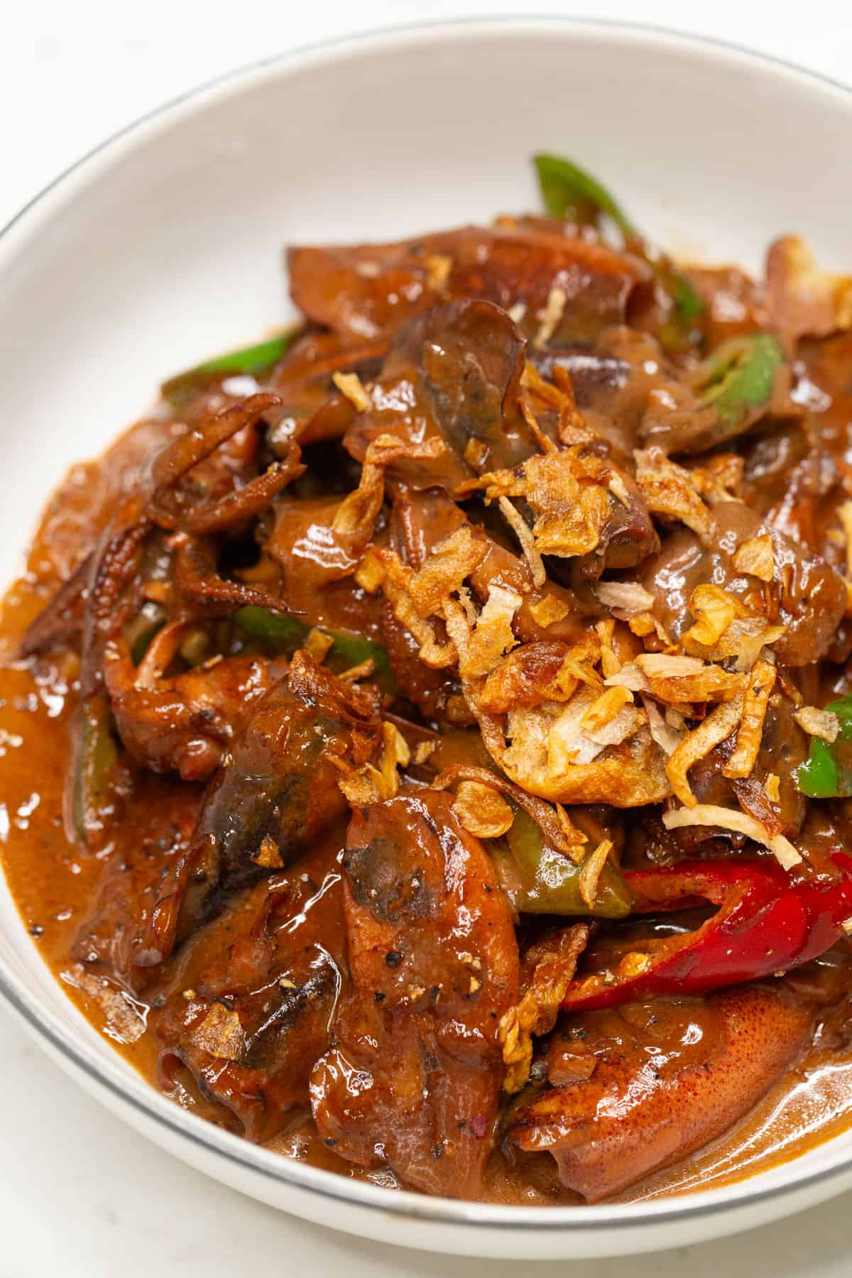 Adobong Pusit sa Gata in a bowl.