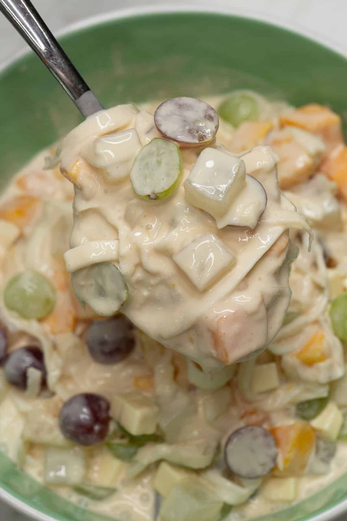 Filipino fruit salad on a spoon.