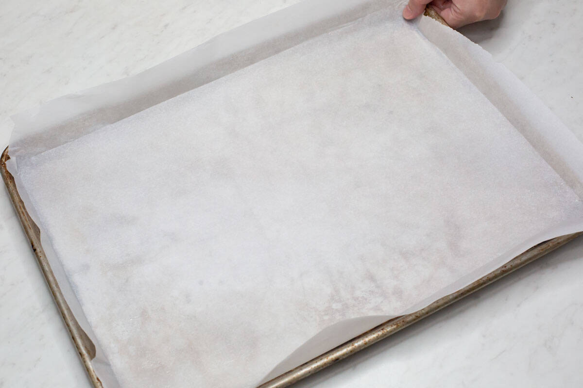 A baking sheet lined with parchment paper.