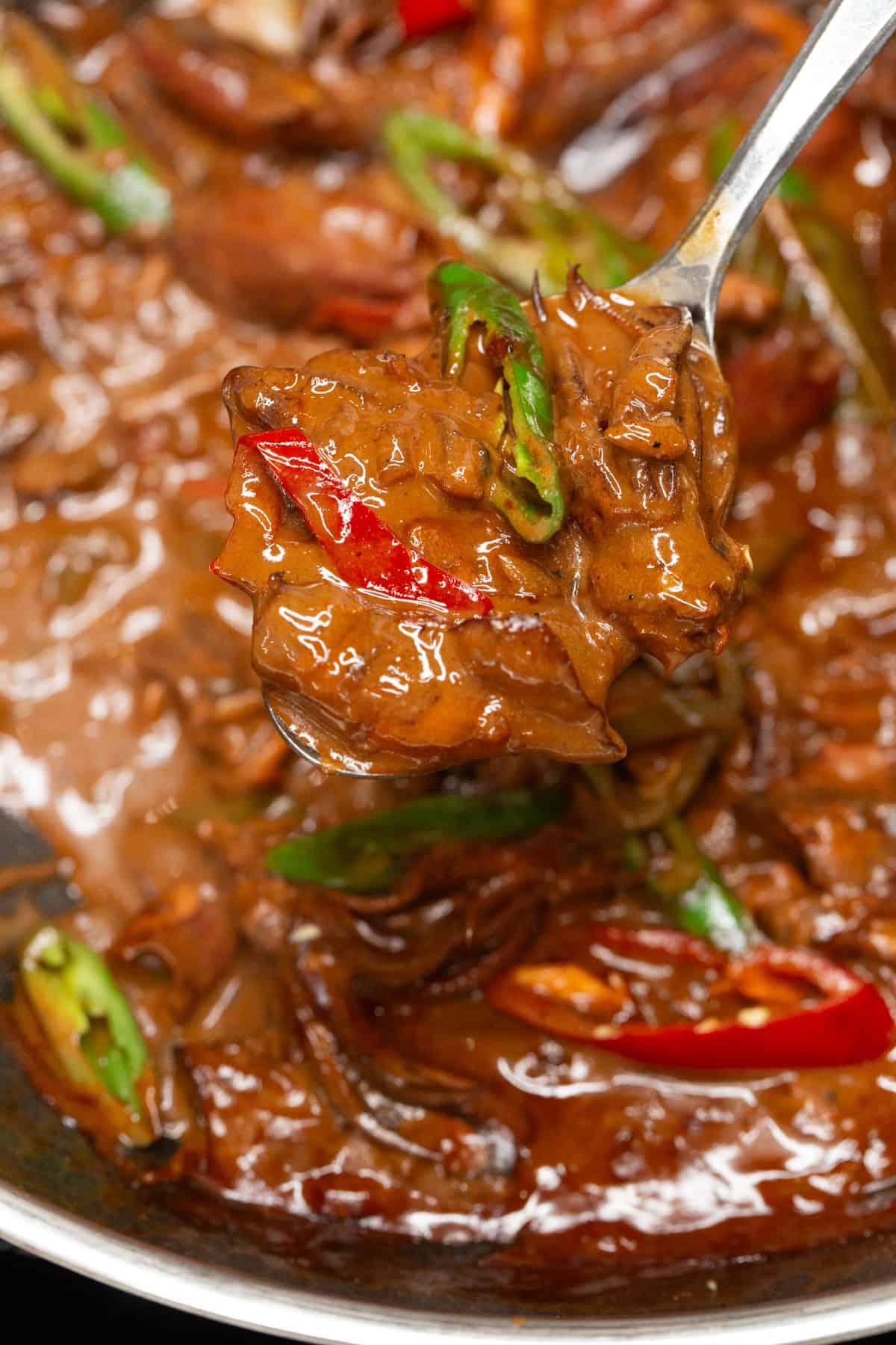 Adobong Pusit sa Gata in a spoon.