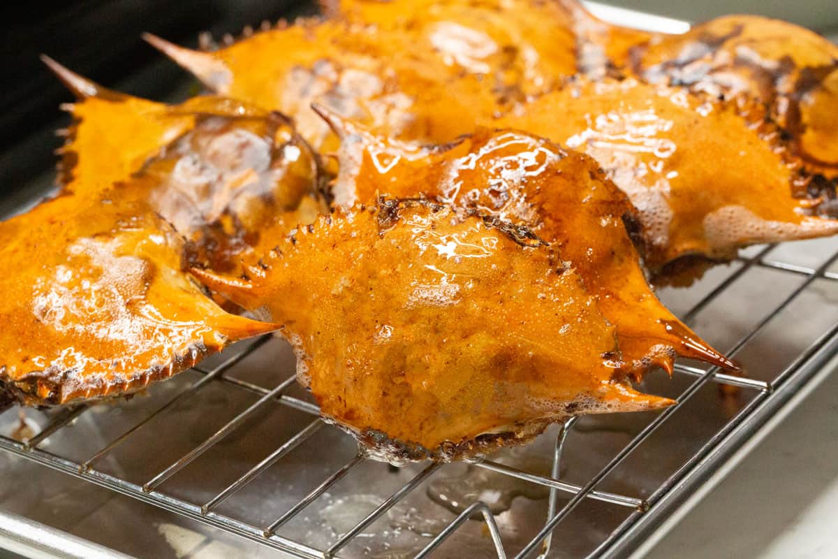 Filipino Crab Relleno (Relyenong Alimasag) on a wire rack.