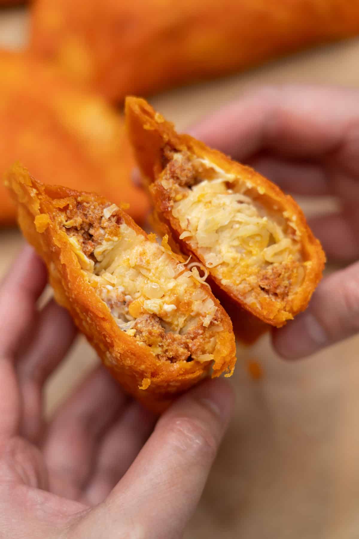 Ilocos empanada (Vigan-style) split in half.