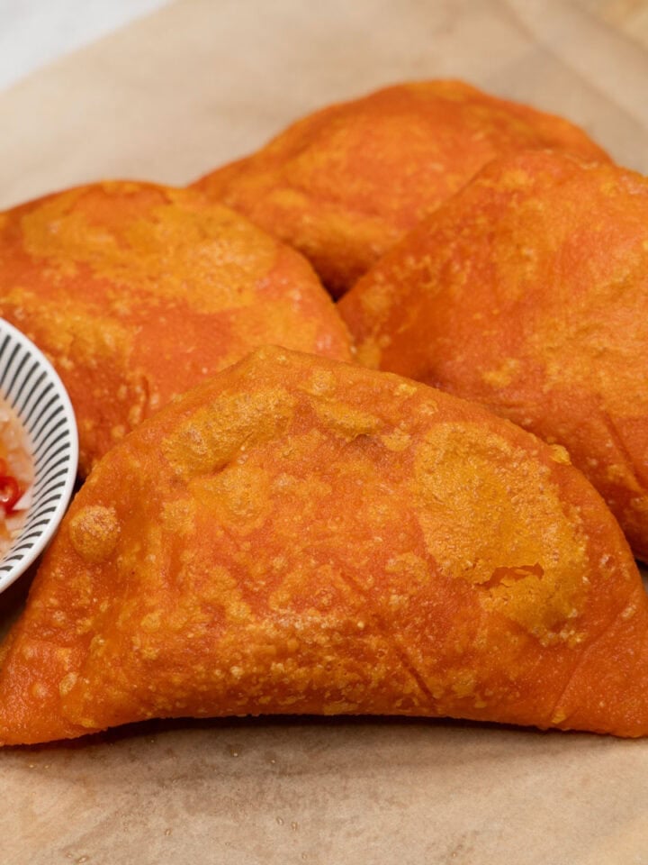 Ilocos Empanada (Vigan Style) on a cutting board
