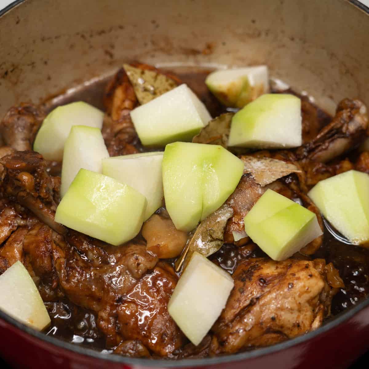 adding chayote on potatoes