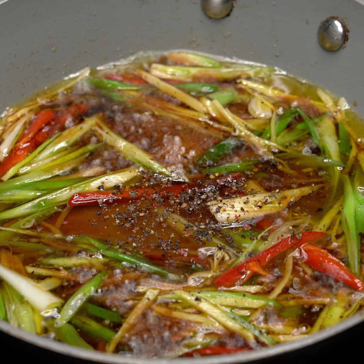 Ginger scallion sauce in a pan.