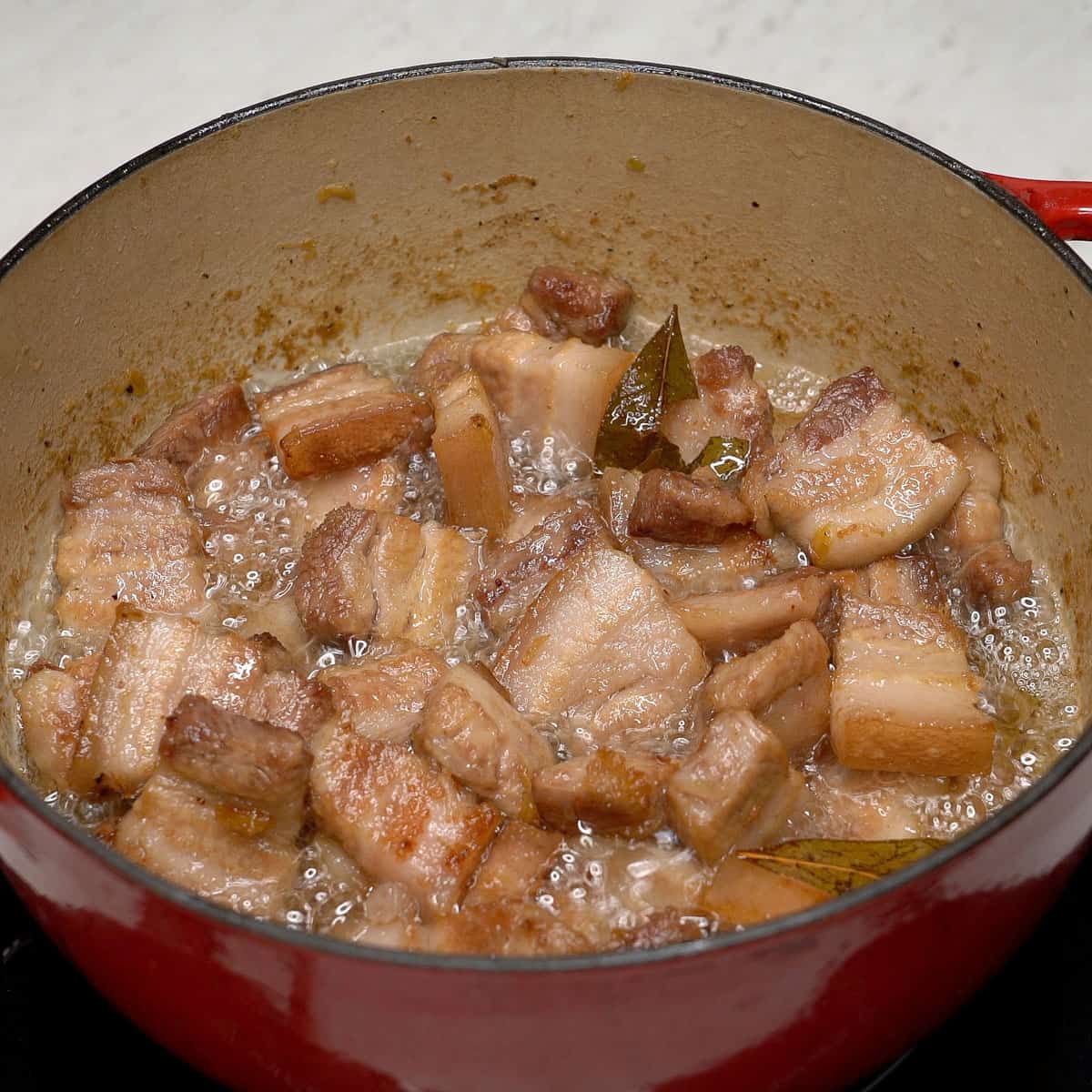 Adobo sa asin cooking in the pot.