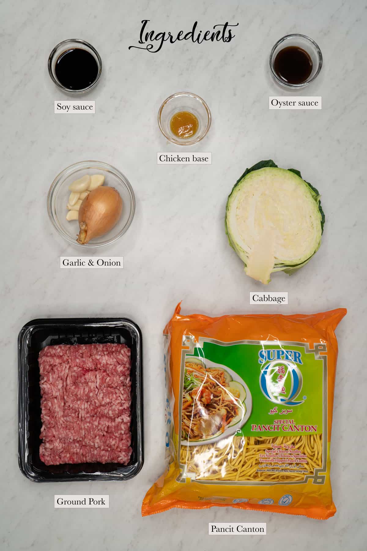 Individual ingredients for pancit canton with ground pork and cabbage