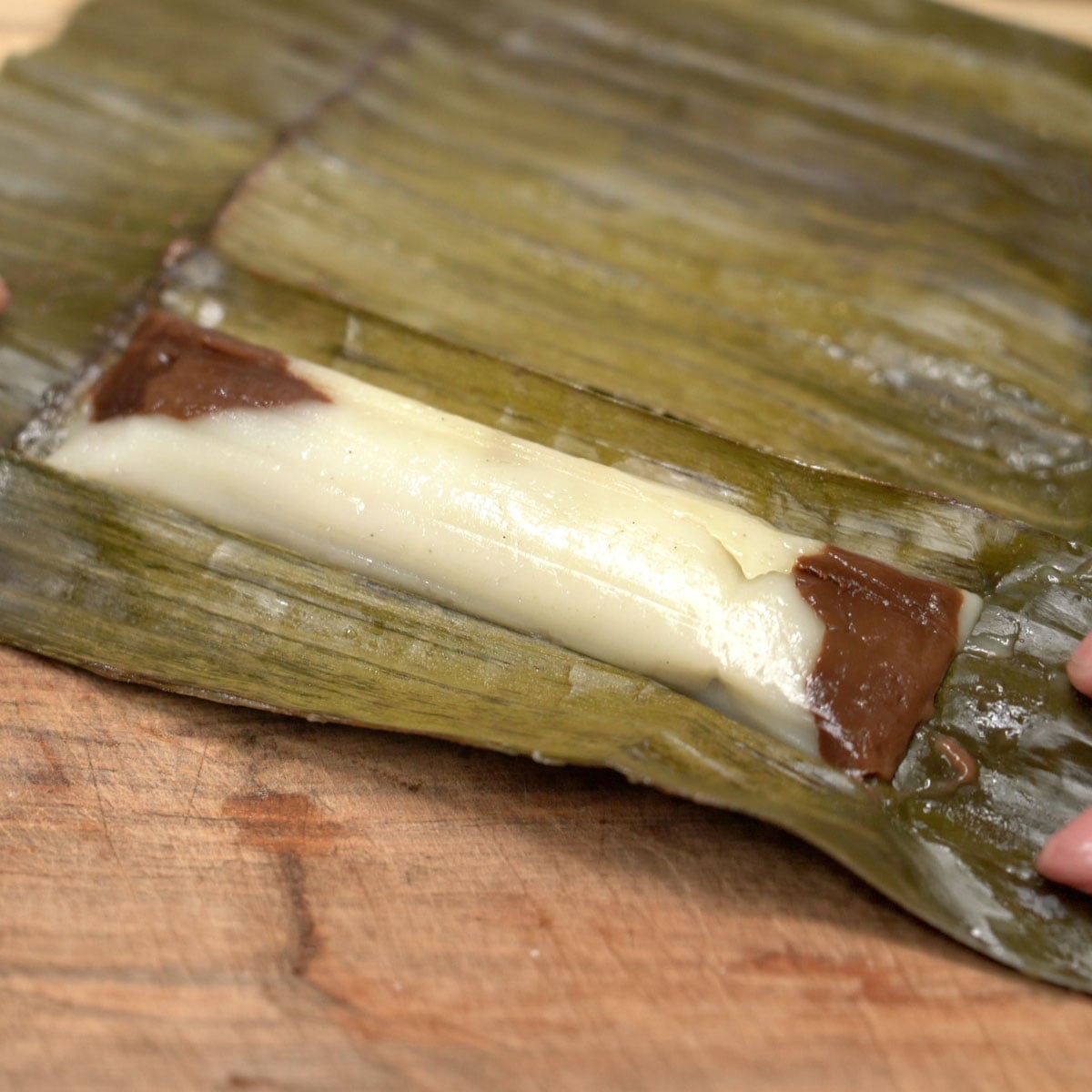 Suman moron on a banana leaf.