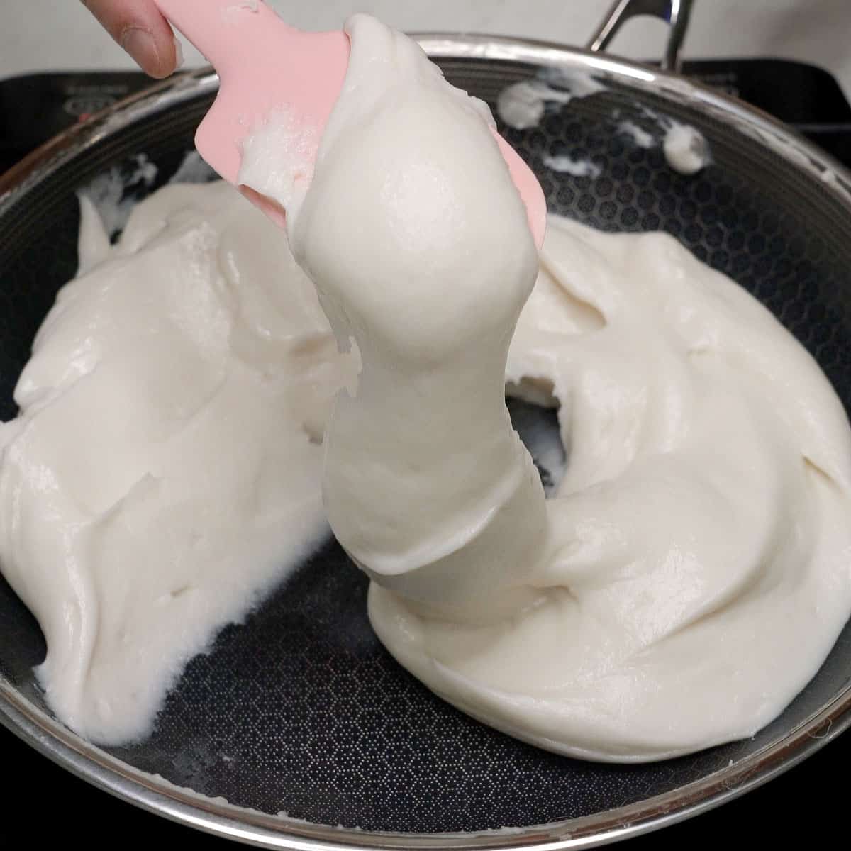 Cooked white layer in the pan.