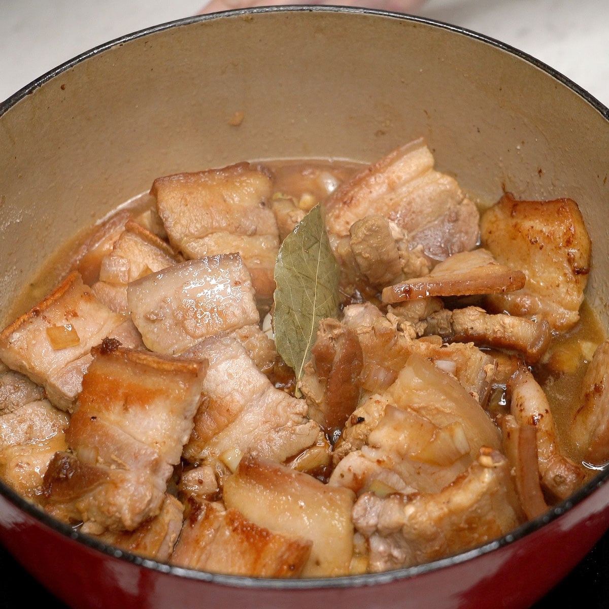 Adobong tuyo simmering in a pot.