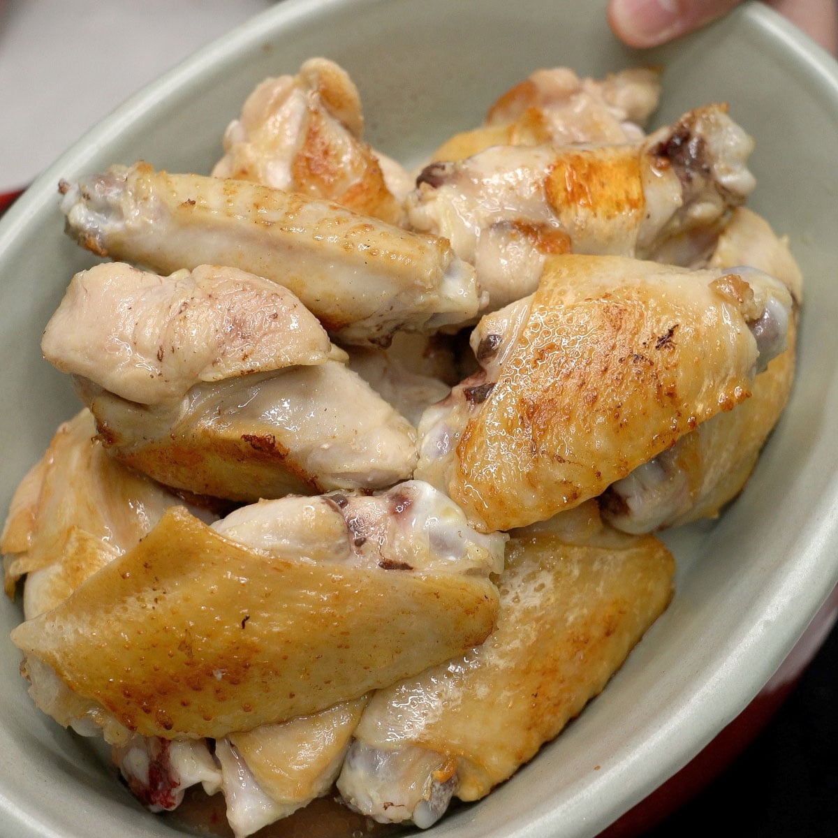 Browned chicken in a bowl.