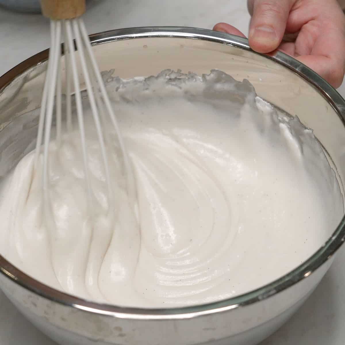 Mxing kalamay lansong batter in a bowl.
