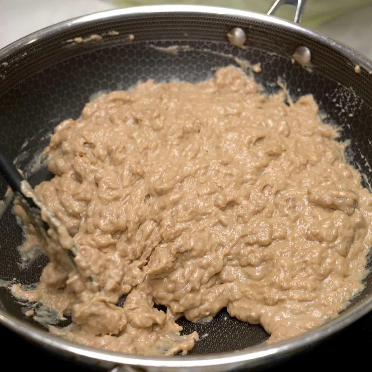 Kalamay hati turning lumpy in the pan.