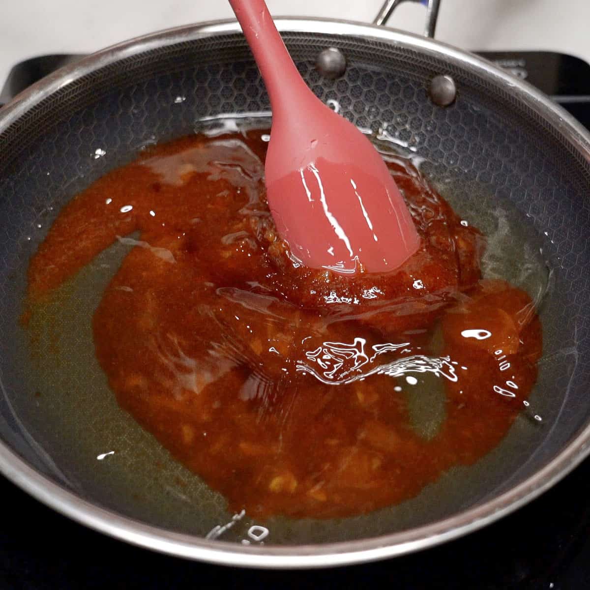 Caramelizing sugar in a pan.