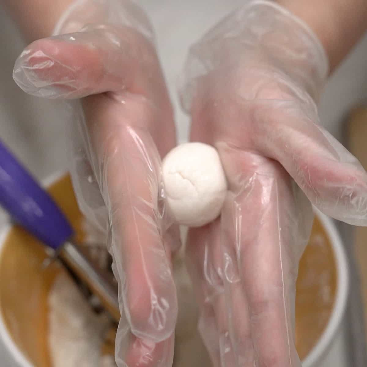 Forming carioca into balls.