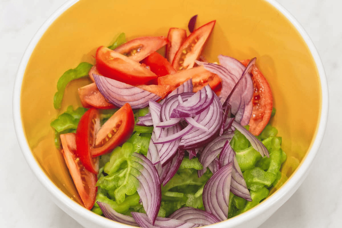 Combining the ingredients in a bowl.